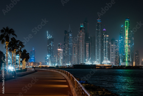 Canvas Print Urban night view of Dubai marina modern architecture with Dubai Ain and sea view