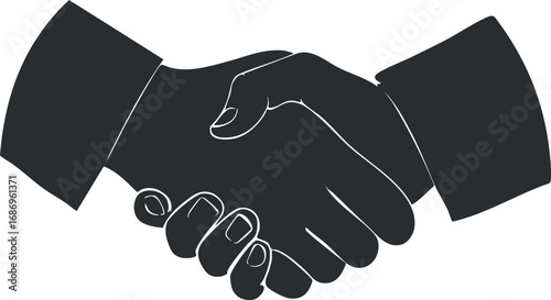Black and white silhouette of two hands shaking symbolizing agreement and partnership in business.