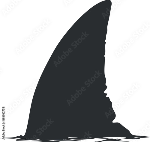Silhouette of a shark fin emerging from the water surface symbolizing marine wildlife and ocean danger