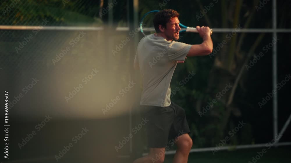 custom made wallpaper toronto digitalAn athletic man plays an active game of tennis on an outdoor court, demonstrating fitness and skill