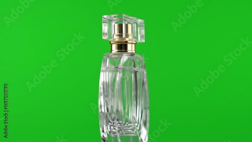 Clear perfume bottle on green screen