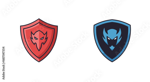 Two cartoon shields with monster faces, red and blue, illustration.
