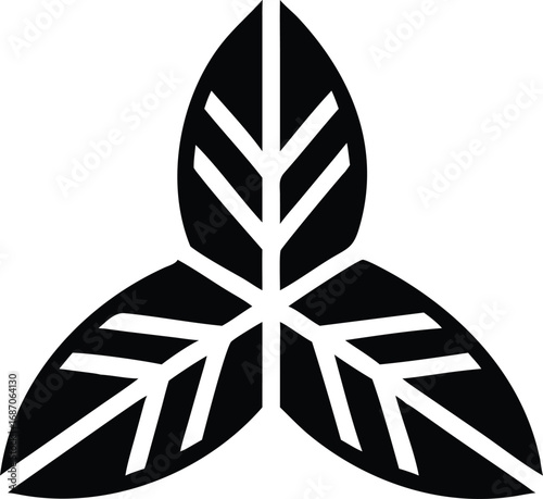A stylized black and white fleur de lis symbol is part of a decorative vector set with elements like a web and a spider