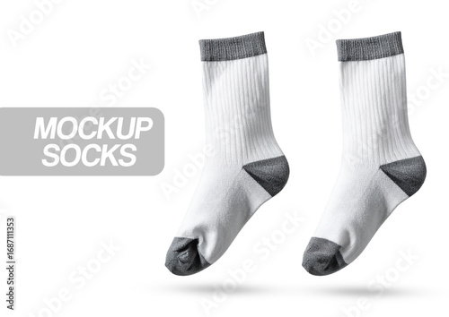 A fashionable pair of female legs in black stockings and matching shoes