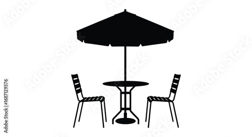 a cozy outdoor seating area with umbrella table and chairs