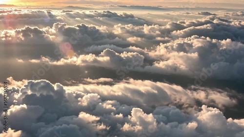 Breathtaking View of Fluffy Clouds and Sunbeams Serene and Ethereal Atmosphere with Warm Glow of Sunset in Sky