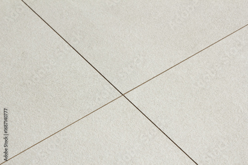 A close-up of a tiled hardwood floor.