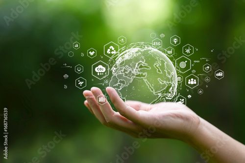 Wallpaper Mural Globe on hand in green forest with icon of Sustainable Development, green business, circular economy, supply chain, . renewable energy, carbon emission to net zero. Earth Day, and ESG concept Torontodigital.ca
