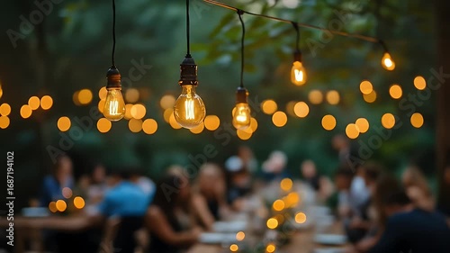 Intimate backyard wedding romantic outdoor ceremony. Outdoor evening dining scene with string lights illuminating guests at a long table