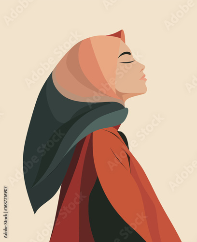 A woman with a calm expression is seen in profile, adorned with a beautifully designed hijab featuring warm colors. The simplicity of the background enhances her elegant presence.
