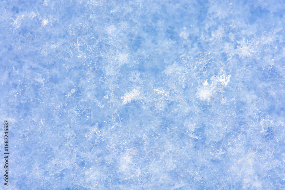Fototapeta premium Winter white background. Background of fresh snow. Snowfall texture background.