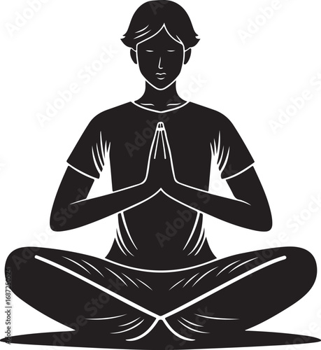 Silhouette of a person meditating in a lotus position