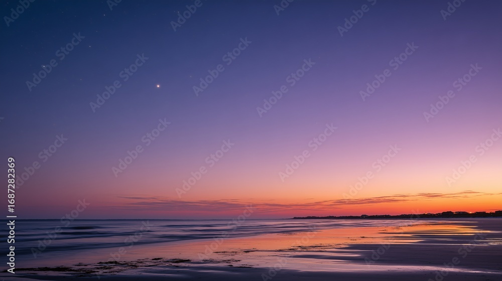 Fototapeta premium A serene beach at dusk, with a soft, purple and orange sky