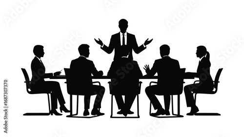 Silhouetted business people in a meeting around a table with a leader speaking