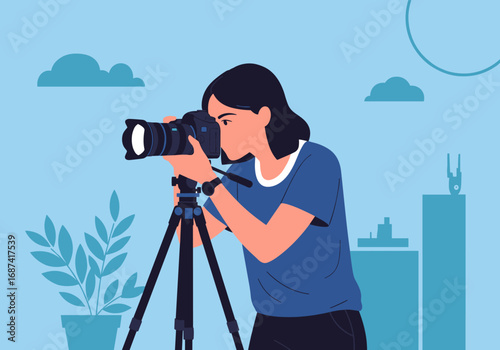 Young woman capturing moment using professional dslr camera mounted on tripod outdoors
