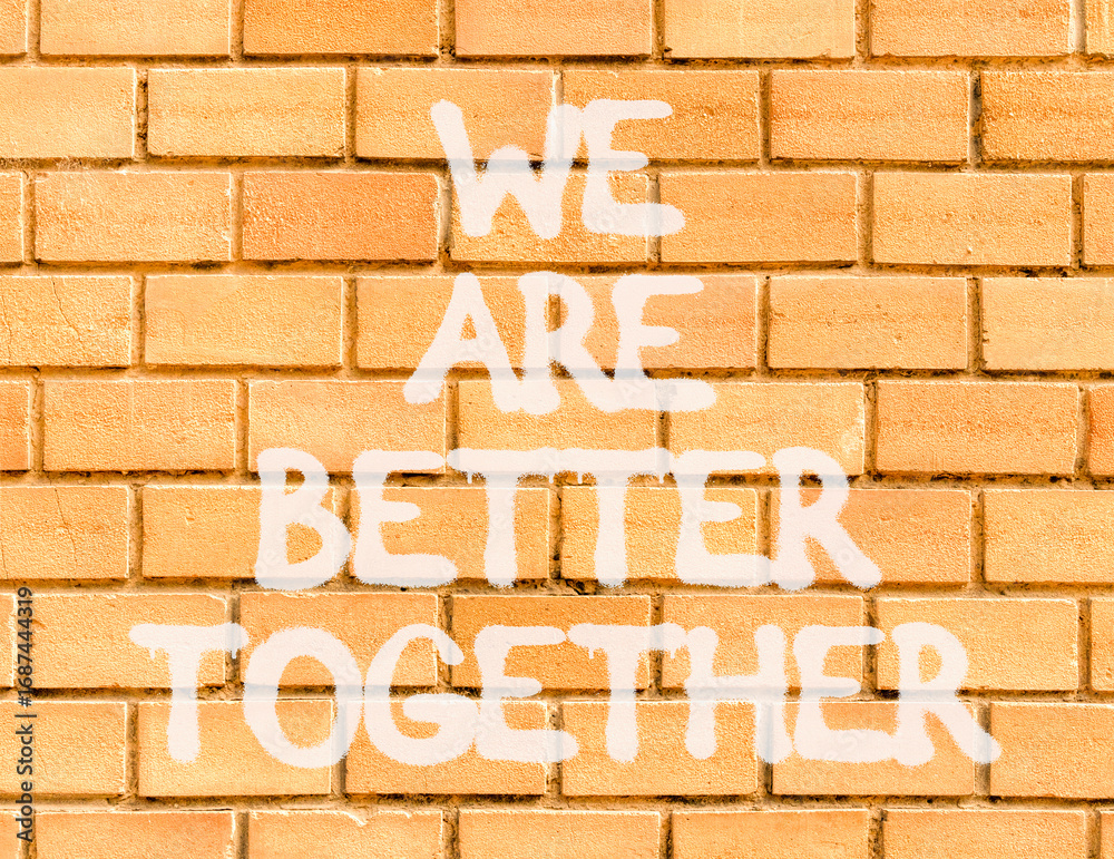 We are better together symbol. Concept words phrase We are better together on beautiful brown brick wall. Beautiful brown brick wall background. Business We are better together concept. Copy space.