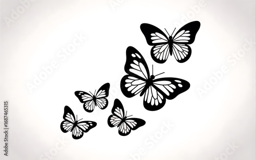 Five Black Butterflies Flying in Formation butterfly