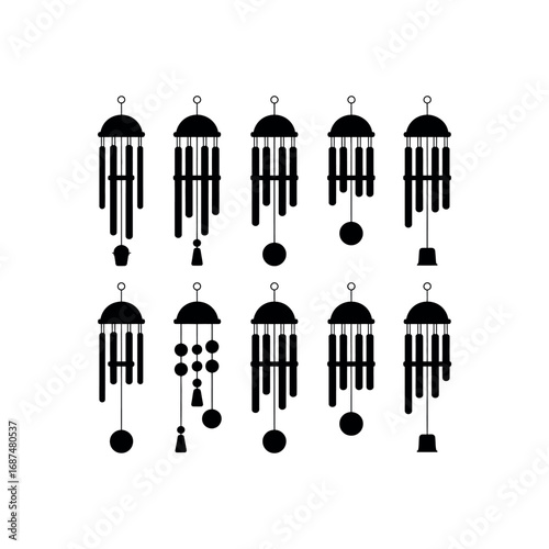 Collection of black silhouette wind chimes with various hanging elements white background