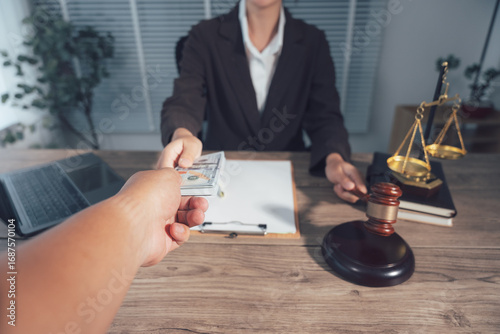 Bribery in Legal Office: The scene shows the act of giving money to a judge, representing corruption and illegal behavior within the legal system.