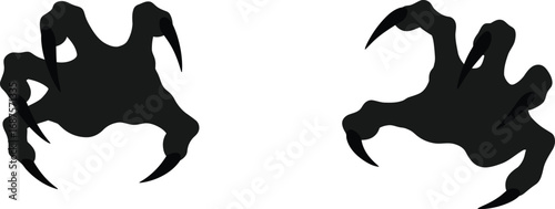 abstract black shapes resembling creatures with sharp claws
