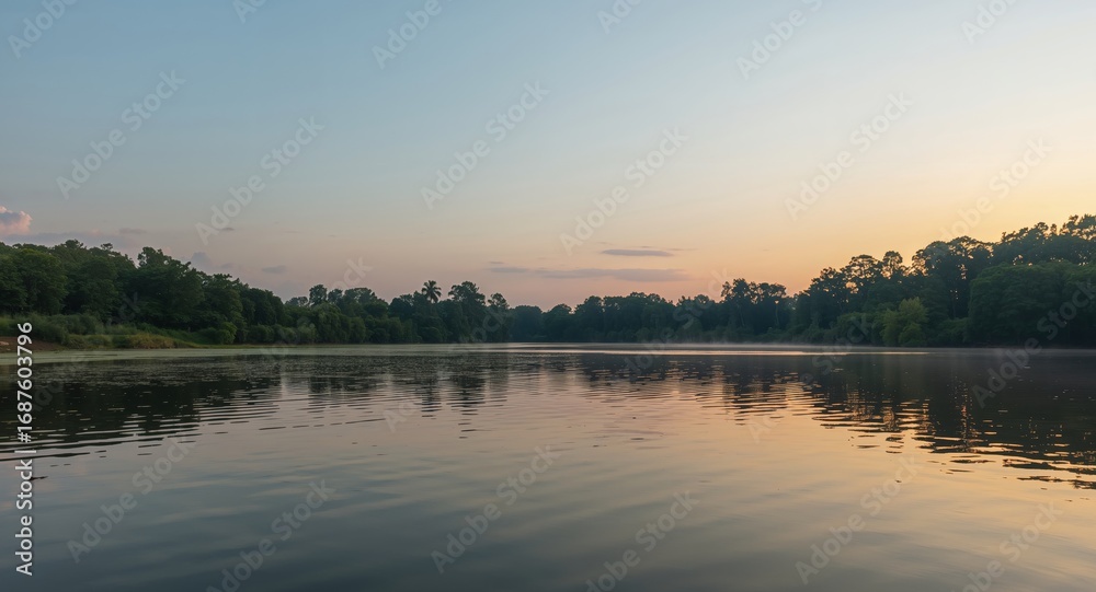 Fototapeta premium Tranquil Waters, Green Horizons. A Quiet Lakeside Scene at the Break of Dawn.