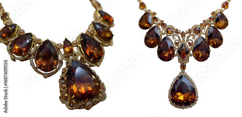 Two ornate necklaces with large ambercolored teardrop gemstones, isolated on transparent background
