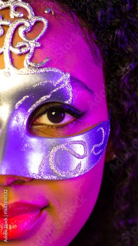Close-up of a person wearing a masquerade mask