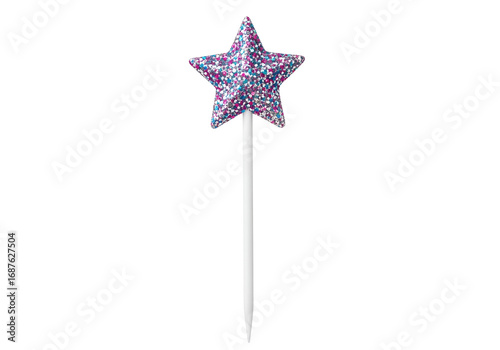 A vibrant, multicolored star-shaped candle topper, with glittering purple, blue, and pink sparkles, stands out against a black background.