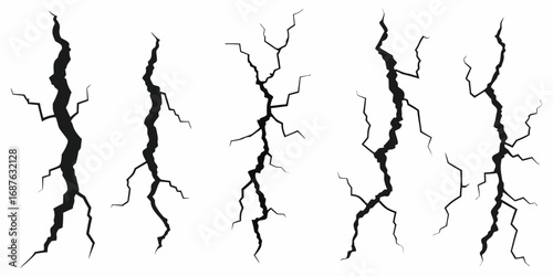 Five Black Crack Silhouettes on White Background fracture break