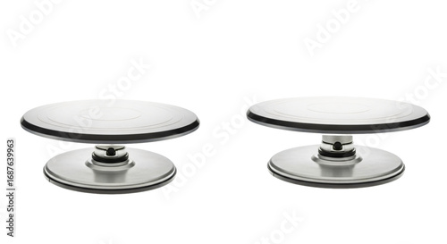 Two Silver Cake Decorating Turntables on White Background.