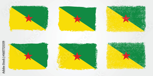 Grunge brush variations of the French Guiana flag