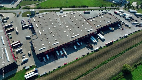 Efficient logistics center with trucks loading and unloading goods