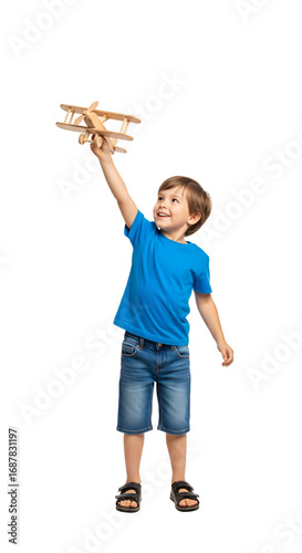 Boy flying a toy airplane
