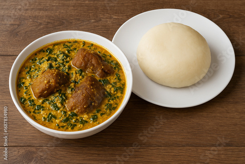 Egusi soup and pounded yam, nigerian cuisine stock photo