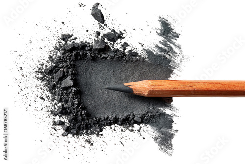 Graphite pencil and scattered dust
