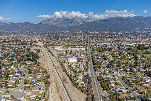 Rancho Cucamonga, San Bernardino County, CA, California, February, 22, 2024: Aerial Drone City View toward Carnelian St and Base Line Rd with Cucamonga Creek Trail,  Red Hill Park, Homes, Houses
