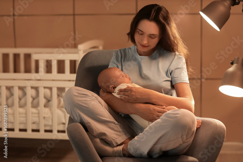 Happy young mother with her...