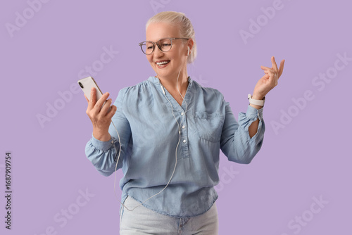 Senior woman with mobile ph...