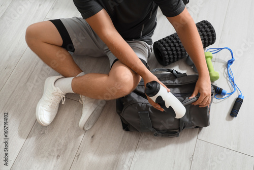 Young athlete preparing for...