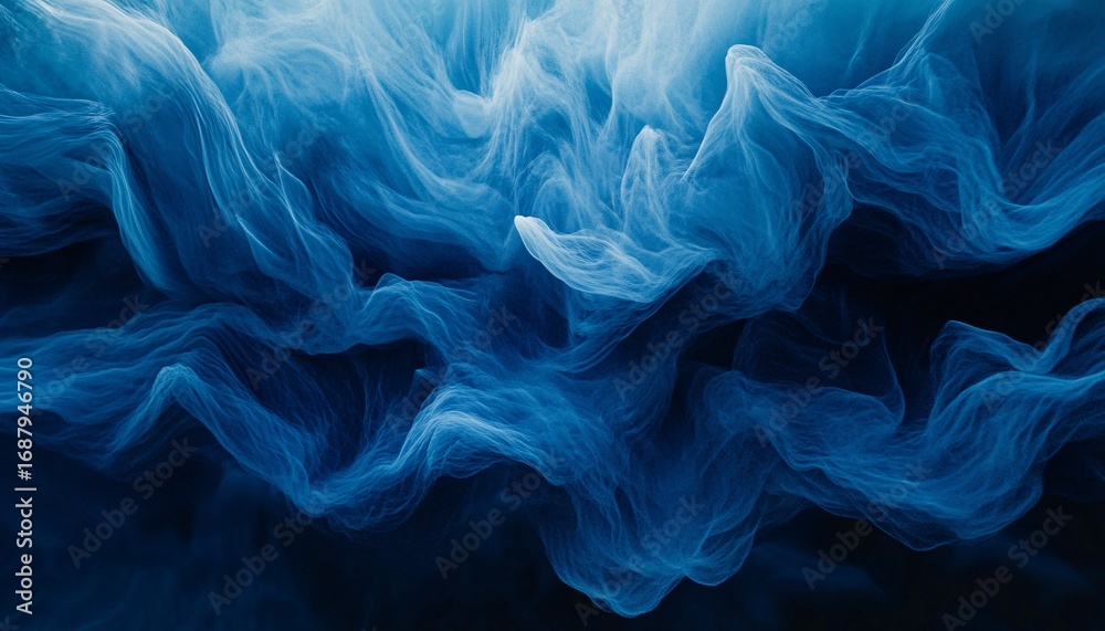 Obraz premium The image shows an abstract representation of blue fabric with a wave-like pattern, captured against a dark background.