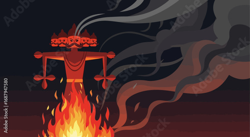 A large, ten-headed effigy of the demon king Ravana burns in a bonfire with thick smoke during the Dussehra festival.