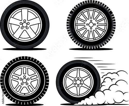 Four car wheels with five spoke rims and tire treads automotive vehicle