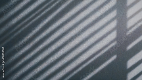 Diagonal Shadow Stripes on Textured Gray Wall Background light pattern