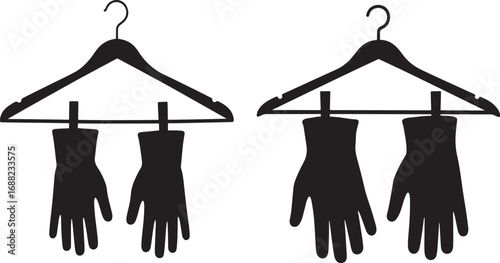 Two pairs of gloves hanging on hangers silhouette