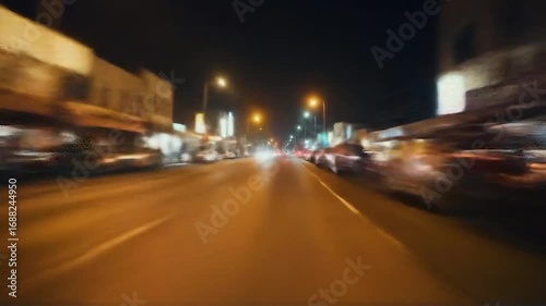 Wallpaper Mural Nighttime City Drive - Blurred Motion POV on a Busy Urban Street with Bright Lights and Traffic. Torontodigital.ca