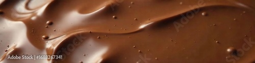 Rich, creamy cocoa milk chocolate melting slowly, revealing a decadent, glossy texture Perfect for confectionery, dessert, or beverage imagery , swirl, sweetness