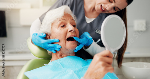 Schilderij op canvas Dentist, senior woman and consulting with mirror for teeth cleaning, dental implant or oral hygiene