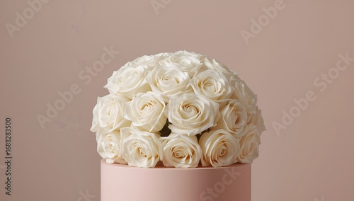 Elegant Floral Still Life with Creamy Roses and a SoftHued, Cylindrical Base.