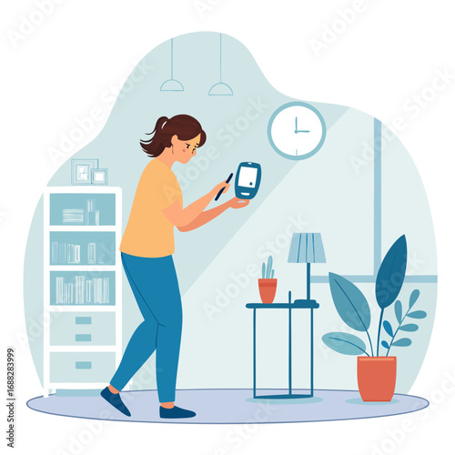 Woman monitoring her blood glucose level at home.