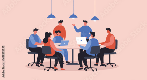 Diverse team of professionals collaborating around a table with laptops in a modern office meeting room, discussing ideas and planning strategy.